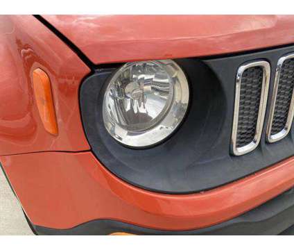 2015 Jeep Renegade Latitude is a Orange 2015 Jeep Renegade Latitude SUV in Rosenberg TX