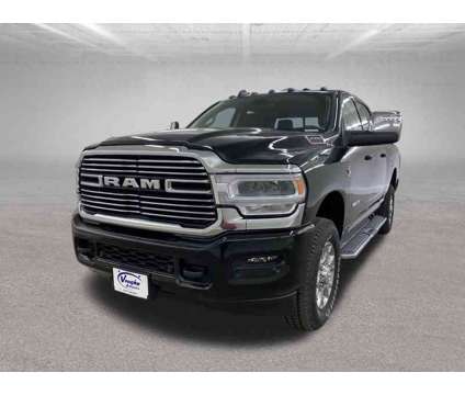 2024 Ram 2500 Laramie is a Black 2024 RAM 2500 Model Laramie Truck in Ottumwa IA