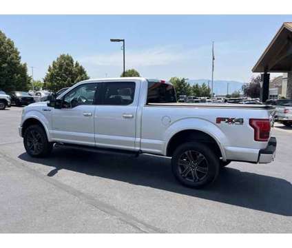 2015 Ford F-150 LARIAT is a Silver 2015 Ford F-150 Lariat Truck in Logan UT