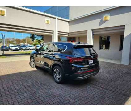 2023 Hyundai Santa Fe SEL is a Black 2023 Hyundai Santa Fe SUV in Fort Walton Beach FL