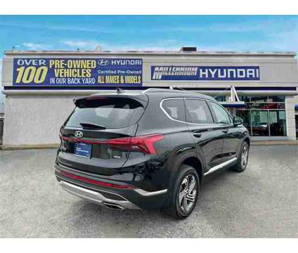 2021 Hyundai Santa Fe SEL is a Black 2021 Hyundai Santa Fe SUV in Hempstead NY