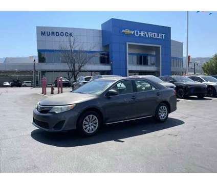 2013 Toyota Camry LE is a Grey 2013 Toyota Camry LE Sedan in Woods Cross UT