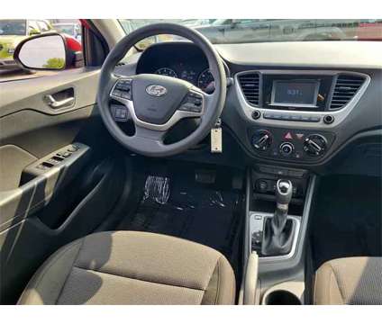 2020 Hyundai Accent SE is a Red 2020 Hyundai Accent SE Sedan in Bloomfield NJ