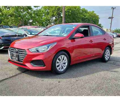 2020 Hyundai Accent SE is a Red 2020 Hyundai Accent SE Sedan in Bloomfield NJ