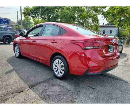 2020 Hyundai Accent SE is a Red 2020 Hyundai Accent SE Sedan in Bloomfield NJ