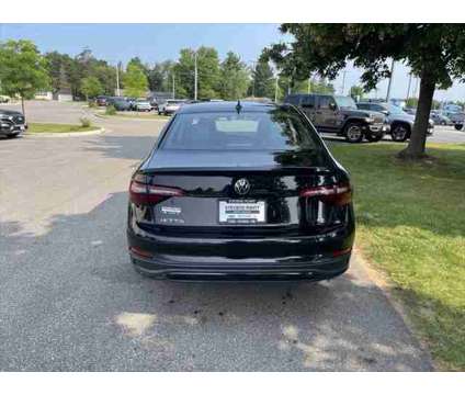 2023 Volkswagen Jetta 1.5T SE is a Black 2023 Volkswagen Jetta 2.5 Trim Sedan in Stevens Point WI