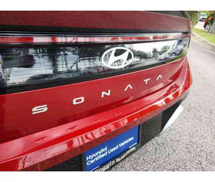 2024 Hyundai Sonata SEL is a Red 2024 Hyundai Sonata Sedan in Deland FL
