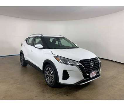 2021 Nissan Kicks SV is a White 2021 Nissan Kicks SV Car for Sale in Peoria IL