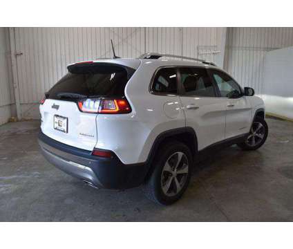 2020 Jeep Cherokee Limited 4X4 is a White 2020 Jeep Cherokee Limited SUV in Manhattan KS