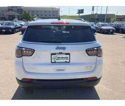 2022 Jeep Compass Latitude 4x4 is a White 2022 Jeep Compass Latitude SUV in Dubuque IA