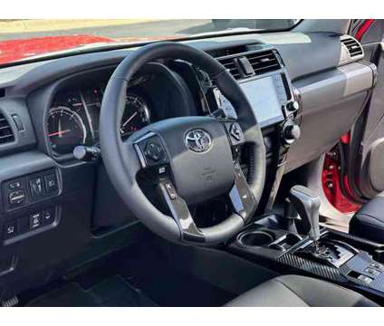 2024 Toyota 4Runner TRD Off Road Premium 4WD is a Red 2024 Toyota 4Runner TRD Off Road Car for Sale in Loves Park IL