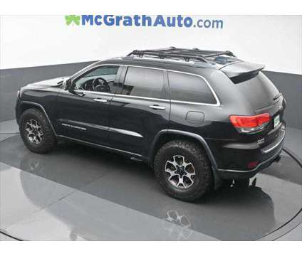 2015 Jeep Grand Cherokee Limited is a Black, Green 2015 Jeep grand cherokee Limited SUV in Dubuque IA