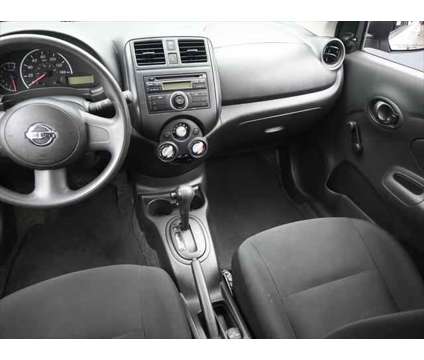 2014 Nissan Versa 1.6 S is a Silver 2014 Nissan Versa 1.6 Trim Sedan in Dubuque IA