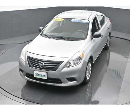 2014 Nissan Versa 1.6 S is a Silver 2014 Nissan Versa 1.6 Trim Sedan in Dubuque IA