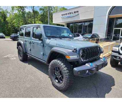 2024 Jeep Wrangler 4xe Willys is a 2024 Jeep Wrangler SUV in Freehold NJ