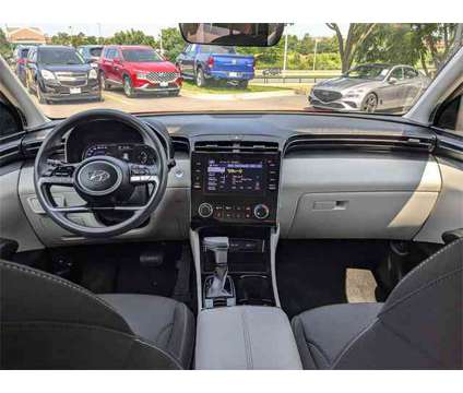 2022 Hyundai Tucson SEL is a Red 2022 Hyundai Tucson SUV in Algonquin IL