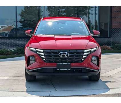 2022 Hyundai Tucson SEL is a Red 2022 Hyundai Tucson SUV in Algonquin IL