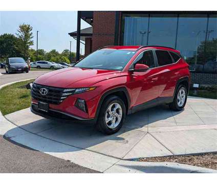 2022 Hyundai Tucson SEL is a Red 2022 Hyundai Tucson SUV in Algonquin IL