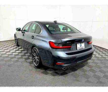 2021 BMW 3 Series xDrive is a Grey 2021 BMW 3-Series Sedan in Freeport NY