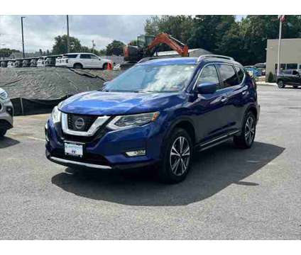 2017 Nissan Rogue SL is a Blue 2017 Nissan Rogue SL Station Wagon in Utica NY