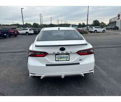 2023 Toyota Camry SE Hybrid is a Silver 2023 Toyota Camry SE Hybrid in Dubuque IA