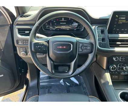 2023 GMC Yukon 4WD AT4 is a Black 2023 GMC Yukon 4WD SUV in Milford MA