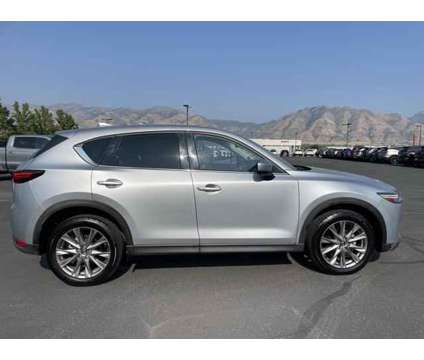 2021 Mazda CX-5 Grand Touring is a Silver 2021 Mazda CX-5 Grand Touring SUV in Logan UT