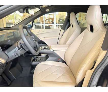 2025 BMW iX xDrive50 is a Blue 2025 BMW 325 Model iX SUV in Westbrook ME