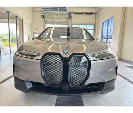 2025 BMW iX xDrive50 is a Grey 2025 BMW 325 Model iX SUV in Westbrook ME