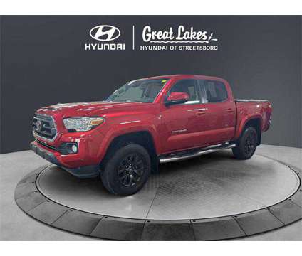 2021 Toyota Tacoma SR5 V6 is a Red 2021 Toyota Tacoma SR5 Truck in Streetsboro OH