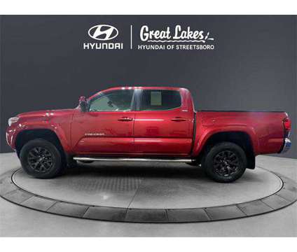 2021 Toyota Tacoma SR5 V6 is a Red 2021 Toyota Tacoma SR5 Truck in Streetsboro OH