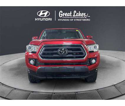 2021 Toyota Tacoma SR5 V6 is a Red 2021 Toyota Tacoma SR5 Truck in Streetsboro OH