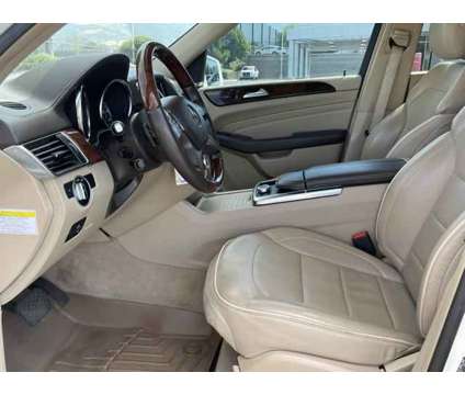 2013 Mercedes-Benz M-Class 4MATIC is a Black 2013 Mercedes-Benz M Class SUV in Woods Cross UT