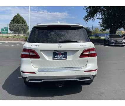 2013 Mercedes-Benz M-Class 4MATIC is a Black 2013 Mercedes-Benz M Class SUV in Woods Cross UT