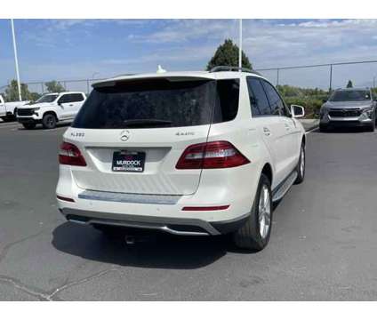 2013 Mercedes-Benz M-Class 4MATIC is a Black 2013 Mercedes-Benz M Class SUV in Woods Cross UT