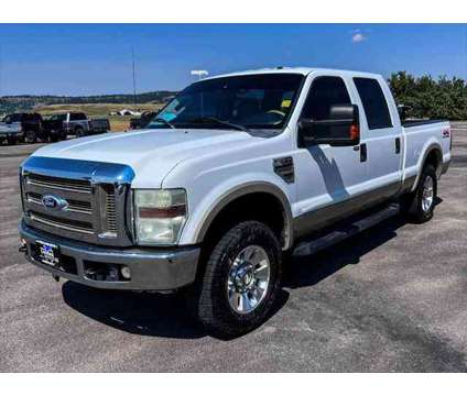 2008 Ford F-250 LARIAT is a White 2008 Ford F-250 Lariat Truck in Spearfish SD