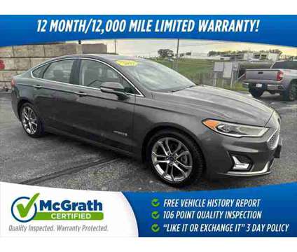 2019 Ford Fusion Hybrid Titanium is a Silver 2019 Ford Fusion Hybrid Titanium Hybrid in Dubuque IA