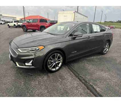 2019 Ford Fusion Hybrid Titanium is a Silver 2019 Ford Fusion Hybrid Titanium Hybrid in Dubuque IA