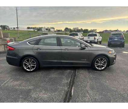 2019 Ford Fusion Hybrid Titanium is a Silver 2019 Ford Fusion Hybrid Titanium Hybrid in Dubuque IA