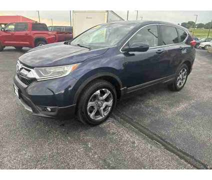 2019 Honda CR-V EX is a Blue 2019 Honda CR-V EX SUV in Dubuque IA