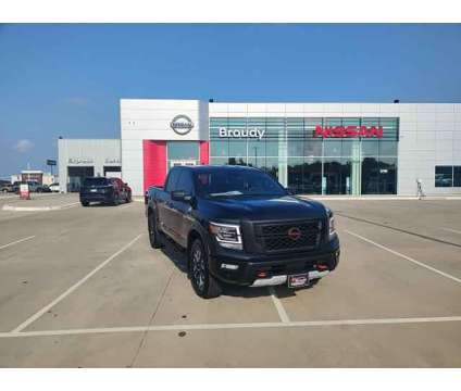 2024 Nissan Titan Crew Cab PRO-4X 4x4 is a Black 2024 Nissan Titan Crew Cab Truck in Ardmore OK