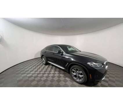 2024 BMW X4 xDrive30i is a Black 2024 BMW X4 xDrive30i SUV in Freeport NY