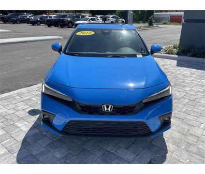 2023 Honda Civic Sport Touring Hatchback is a Blue 2023 Honda Civic Sport Hatchback in Leesburg FL