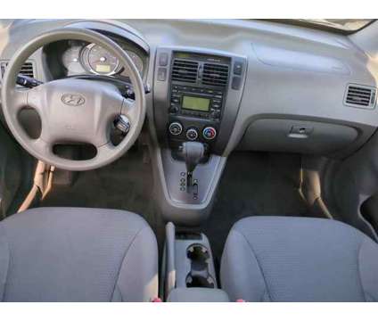 2009 Hyundai Tucson GLS is a Silver 2009 Hyundai Tucson GLS SUV in Daytona Beach FL