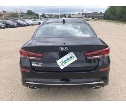 2020 Kia Optima SE is a Black 2020 Kia Optima SE Sedan in Dubuque IA