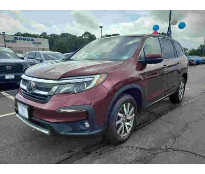 2021UsedHondaUsedPilotUsedAWD is a Red 2021 Honda Pilot Car for Sale in Edison NJ