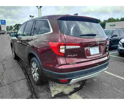 2021UsedHondaUsedPilotUsedAWD is a Red 2021 Honda Pilot Car for Sale in Edison NJ