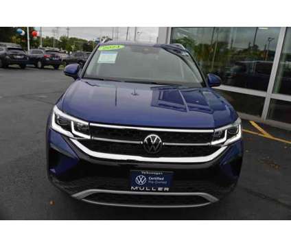 2024 Volkswagen Taos 1.5T SEL is a Blue 2024 SUV in Highland Park IL