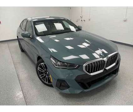 2024 BMW 5 Series i xDrive is a Green 2024 BMW 5-Series Sedan in Erie PA