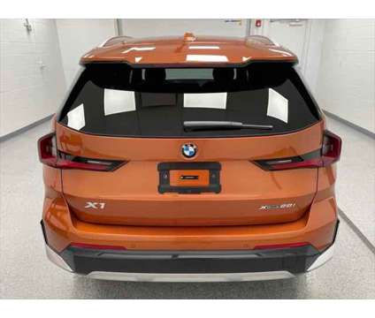 2024 BMW X1 xDrive28i is a Orange 2024 BMW X1 xDrive 28i SUV in Erie PA